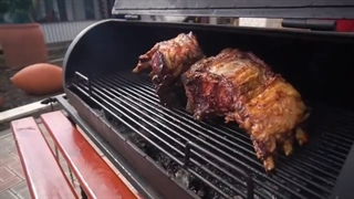 Chicken in a smoker.