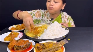 Big bites.EATING RICE WITH DAL,BORAR KALIYA,RITHA KALIYA,TELAPIAR JHOL,SORSHE AMUDE,//
