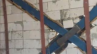نحوه مهار دیوار در دهانه مهاربندی مطابق آیین نامه