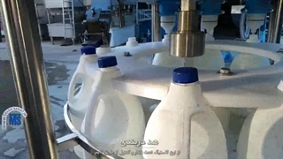 دستگاه پرکن و دربند جوهر نمک و اسید توان صنعت | 09152000050